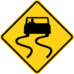 A yellow diamond showing a black car with two wavy lines trailing behind it